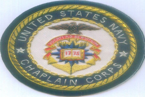 Ein rundes Patch mit blauem Hintergrund und weißer Umrandung, das den Text 'United States Navy Chaplain Corps' in weiß zeigt, mittig platziert.