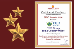 Auszeichnung für den NGO Award 2020 mit dem Text "Chd Group India Country Office" und einem Schild-Logo mit einem zentralen Stern und einem Lorbeerkranz auf der rechten Seite sowie drei Sternen auf der linken Seite.