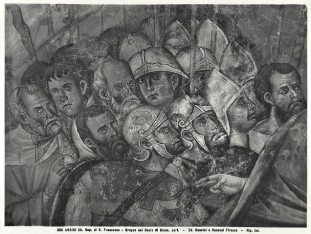 Schwarze und weiße Zeichnung einer Gruppe von Männern in einer Menge, einige sehen ängstlich nach oben und andere verwirrt nach unten, mit Text unten, der eine Schlachtenszene erwähnt.