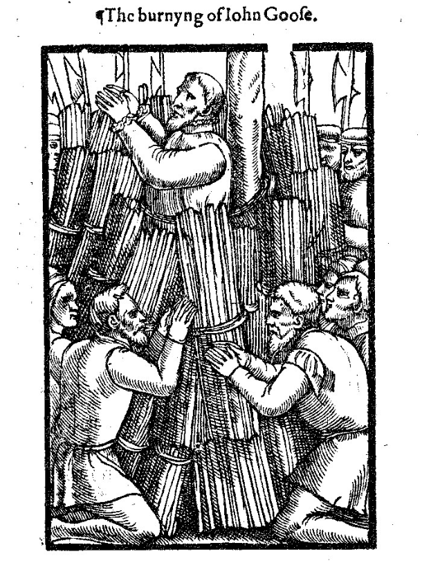Schwarze und weiße historische Illustration mit dem Titel "The Burning of John Goofe", die eine Gruppe von Menschen vor einem brennenden Gebäude zeigt.
