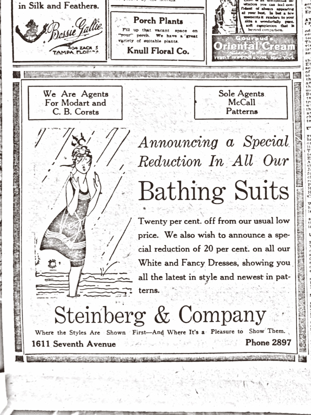 Eine Frau in einem weißen hochgeschlossenen, langärmligen Kleid mit einem Dutt, die zentral in einer Werbung für Steinberg & Company's Badesachen steht, umgeben von Text.